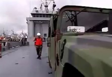 Loading vehicles on Army watercraft